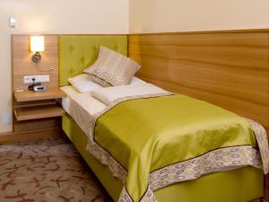 Letto o letti in una camera di Hotel Drei Raben