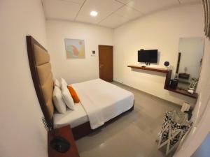 Μια τηλεόραση ή/και κέντρο ψυχαγωγίας στο Caroline Villa, Nuwara Eliya