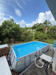 a large swimming pool sitting on top of a patio at Casa taj beach house in La Loma