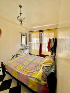 Ένα ή περισσότερα κρεβάτια σε δωμάτιο στο Beach apartment 5 min walk