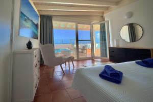 Postel nebo postele na pokoji v ubytování Villa Miranda Los Remos