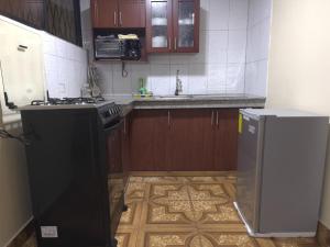 Η κουζίνα ή μικρή κουζίνα στο Apartamento en el norte de Quito en La Planada