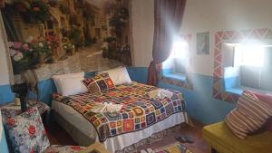 Ένα ή περισσότερα κρεβάτια σε δωμάτιο στο Siwa Bait Ward Home