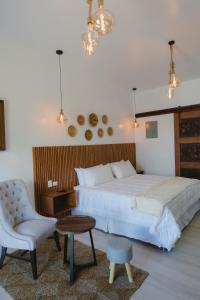 Postel nebo postele na pokoji v ubytování Apartamentos Santa Delfina 2