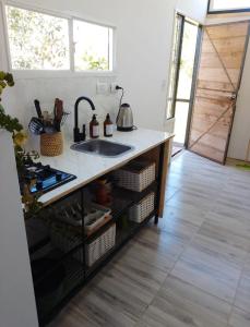 Η κουζίνα ή μικρή κουζίνα στο Tiny House Potrero Cba