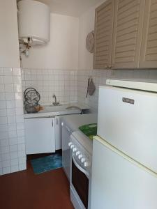 Η κουζίνα ή μικρή κουζίνα στο IMPERIAUX Stéphanie +3 φωτογραφίες