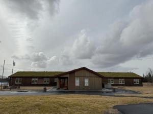 a building with a grass roof on top of it at Aurora Retreat in Selfoss