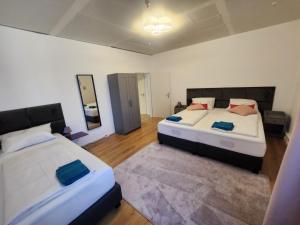 Postel nebo postele na pokoji v ubytování BIG New 7Rooms City Center APARTMENTS and Suites + 128 fotografií