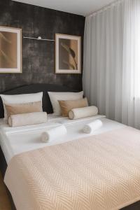 Postel nebo postele na pokoji v ubytování Apartment GREY Comfort