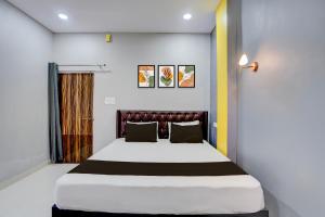 Ένα ή περισσότερα κρεβάτια σε δωμάτιο στο Hotel O RIO