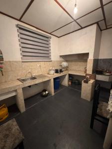 a kitchen with a sink and a counter top at Seliya Villa Retreat in Balapitiya
