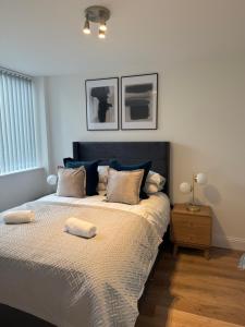Ένα ή περισσότερα κρεβάτια σε δωμάτιο στο Central Gravesend 1BR, Kitchen, Wi-Fi, Sleeps 2, Parking