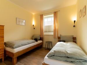 Katil atau katil-katil dalam bilik di Ferienwohnung in Garding