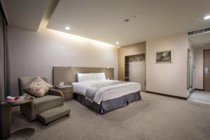 Postel nebo postele na pokoji v ubytování Zhong Ke Hotel