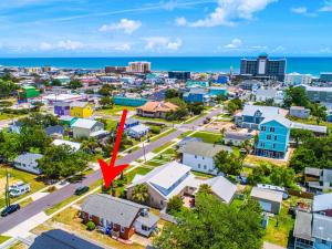 an aerial view of a city with a red arrow at CB Sunshine Cottage in Carolina Beach