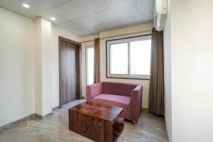 Khu vực ghế ngồi tại Hotel O Alpha Stayz