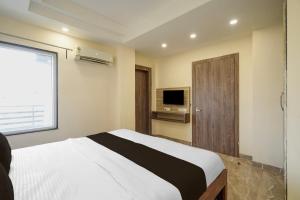 Et tv og/eller underholdning på Hotel O Alpha Stayz