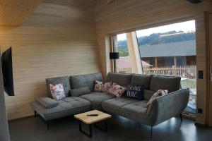 Posezení v ubytování Lindenhof Chalets