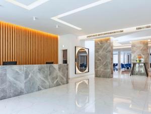 Лобби или стойка регистрации в Blue Sea Holiday Village +37 фотографий