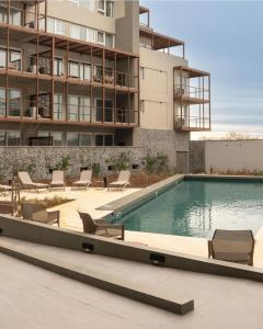 Πισίνα στο ή κοντά στο Departamento de mar- UF5-La Reserva Almarena