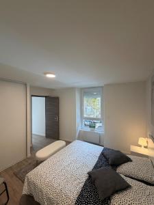 Ένα ή περισσότερα κρεβάτια σε δωμάτιο στο Charmant appartement, 2 chambres au bord des quais