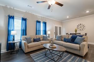 a living room with a couch and a table at 2029 Pinnacle Walk Drive Norcross in Norcross