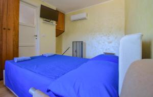 Postel nebo postele na pokoji v ubytování 1 Bedroom Cozy Apartment In Castel Di Tora