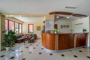 a lobby of a hospital with a reception counter at Atlant Hotel in St. St. Constantine and Helena +41 photos