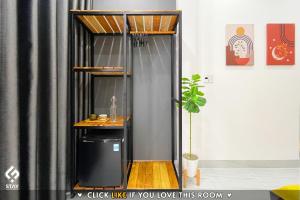 a shower in a room with a black curtain at FSTAY - COZY AND PEACEFUL HOMESTAY DA NANG in Da Nang