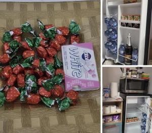 a pile of red peppers in front of a refrigerator at New Era Home in Ottawa