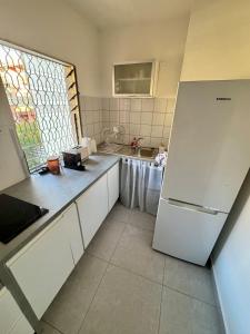 Fotografie z fotogalerie ubytování Appartement rénové équipé à 200m de la plage v destinaci Kourou