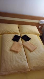 Un pat sau paturi într-o cameră la Apartmán Arsinoe