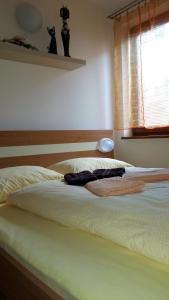 Posteľ alebo postele v izbe v ubytovaní Apartmán Arsinoe