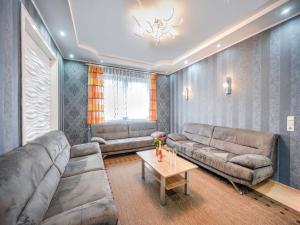 a living room with couches and a coffee table at Villa in Zentrumsnähe, Medebach in Medebach