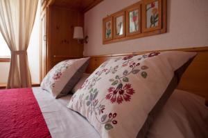 Postel nebo postele na pokoji v ubytování Le Rosier B&B e Appartamento