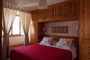 Postel nebo postele na pokoji v ubytování Le Rosier B&B e Appartamento