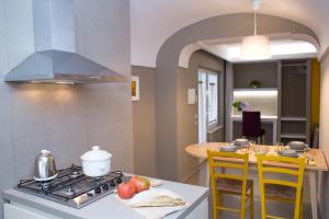 Η κουζίνα ή μικρή κουζίνα στο Relais del Corso