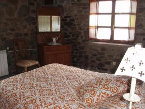 Łóżko lub łóżka w pokoju w obiekcie Casa Rural Ugarte Ojacastro