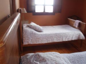 Łóżko lub łóżka w pokoju w obiekcie Casa Rural Ugarte Ojacastro