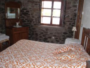 Łóżko lub łóżka w pokoju w obiekcie Casa Rural Ugarte Ojacastro
