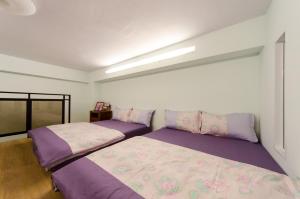 Katil atau katil-katil dalam bilik di Good Mood Cottage