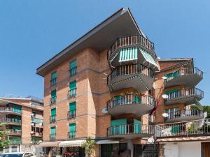 a building with balconies on the side of it at Casa Cariddi in Sperlonga