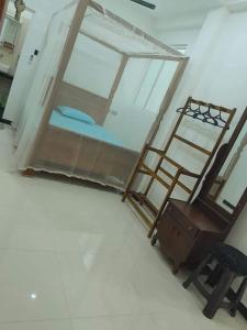 Ένα ή περισσότερα κρεβάτια σε δωμάτιο στο Roshan Villa