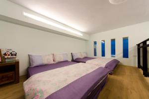 Katil atau katil-katil dalam bilik di Good Mood Cottage