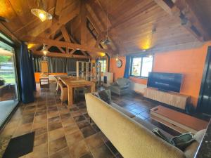a living room with a couch and a table at Vakantie verblijf in Bredene