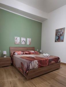 Postel nebo postele na pokoji v ubytování Maison Luisa