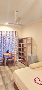 Ένα ή περισσότερα κρεβάτια σε δωμάτιο στο AliTa Villa Zanzibar