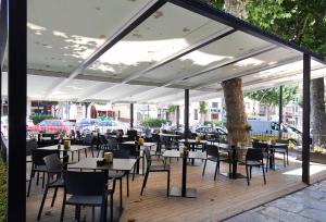 מסעדה או מקום אחר לאכול בו ב-Vila Arenys Hotel