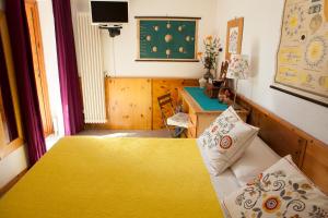 Postel nebo postele na pokoji v ubytování Le Rosier B&B e Appartamento