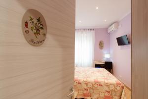 Postel nebo postele na pokoji v ubytování Guest House Le Tre Spezie